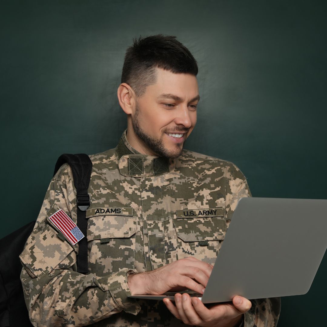 Solider taking an online class
