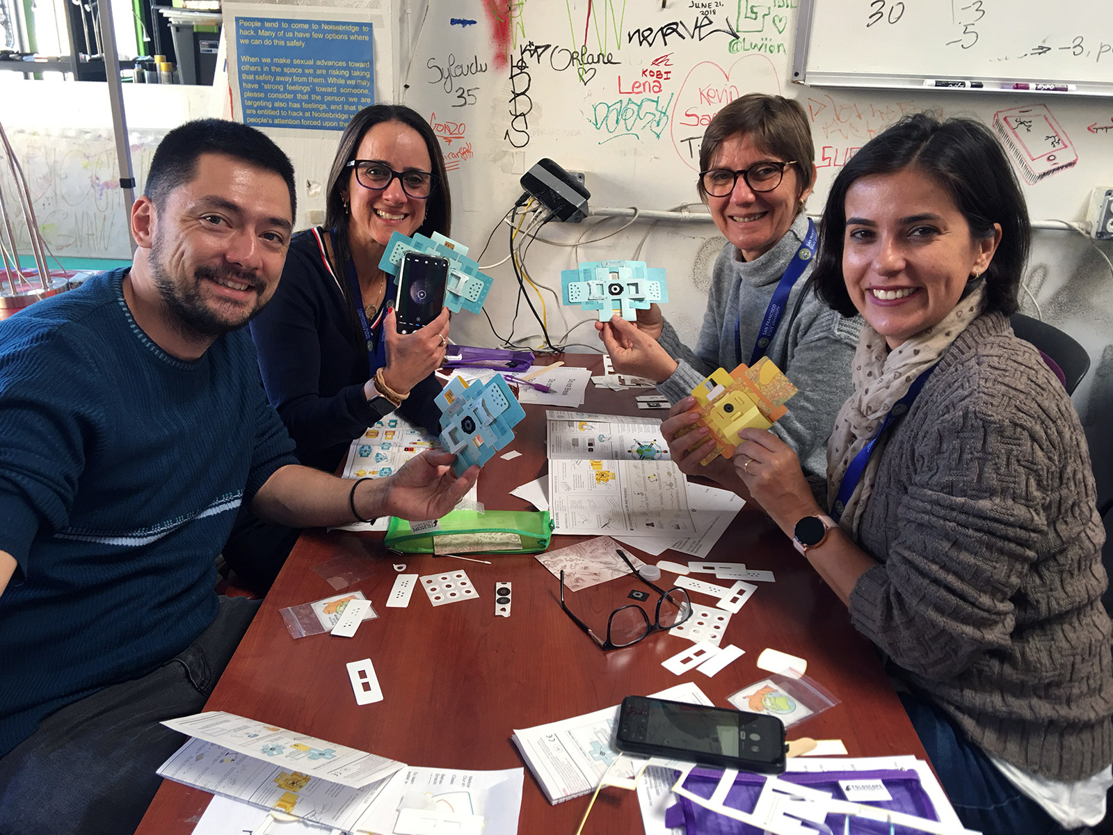 A team of teacher trainees work together on a group project