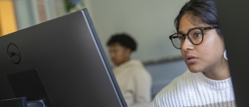 Student looking at a computer screen