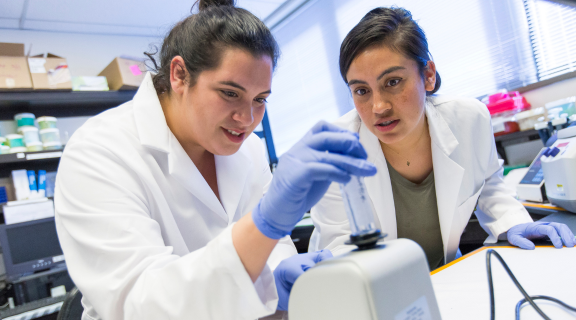 Clinical lab science students working in the laboratory